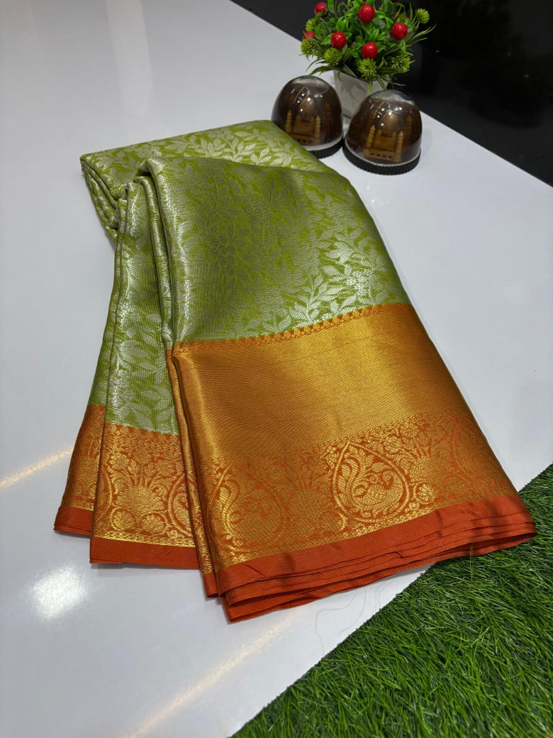 Pure Banarasi soft Katan silk saree in Green with contrast Orange border and zari weaving floral jaal design