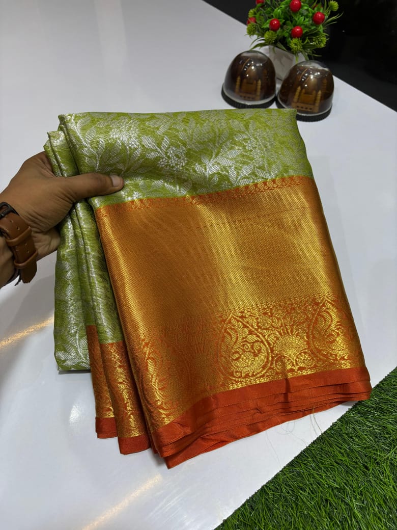 Pure Banarasi soft-Katan silk saree in Green with Orange border and zari weaving floral jaal design