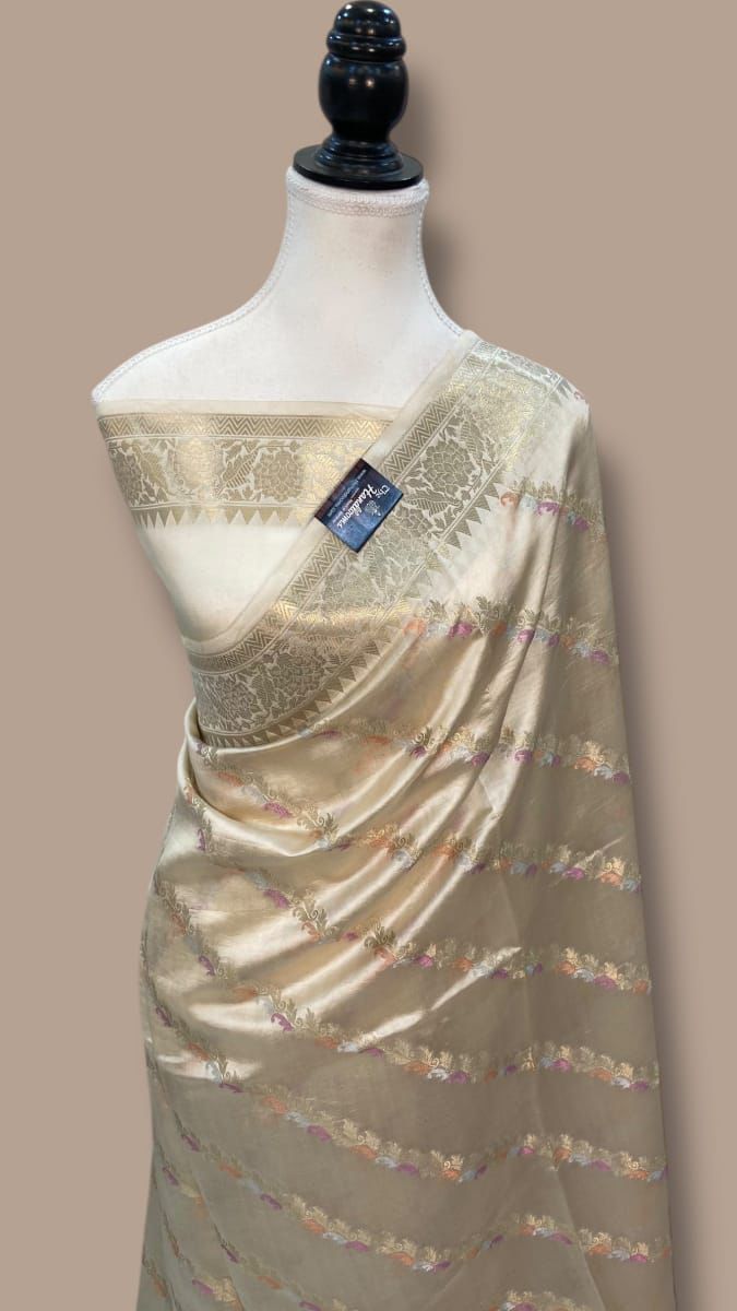 White Banarasi Mina Laheriya saree with intricate zari border and woven pallu