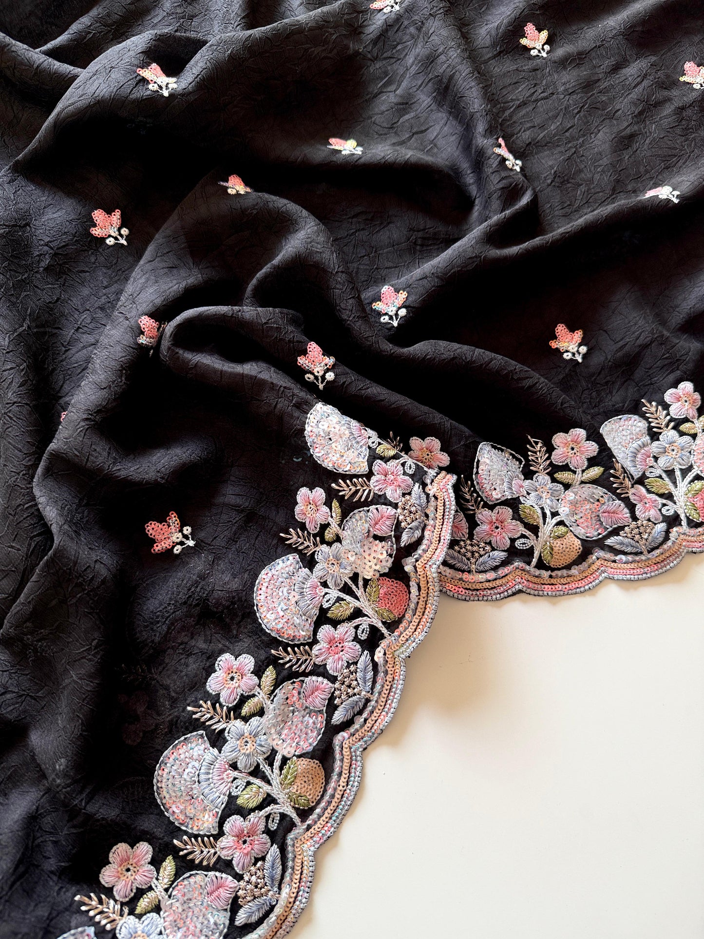 Black fabric with floral embroidery on a white background-Multicolor 4m sequin embroidery saree with soft lightweight fabric