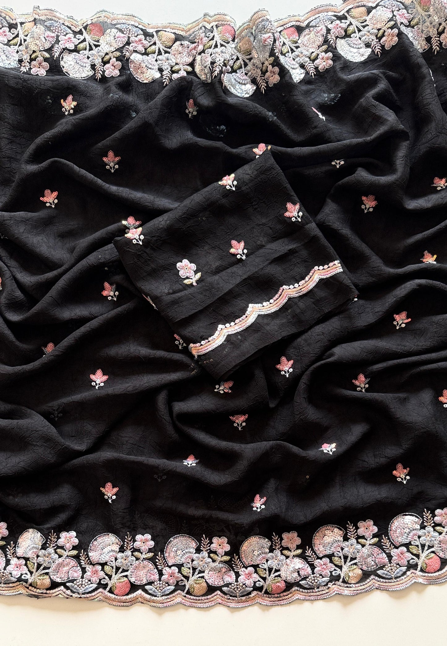 Black fabric with floral embroidery on a white background-Multicolor 4m sequin embroidery saree with soft lightweight fabric-premium-embroidery-black-saree