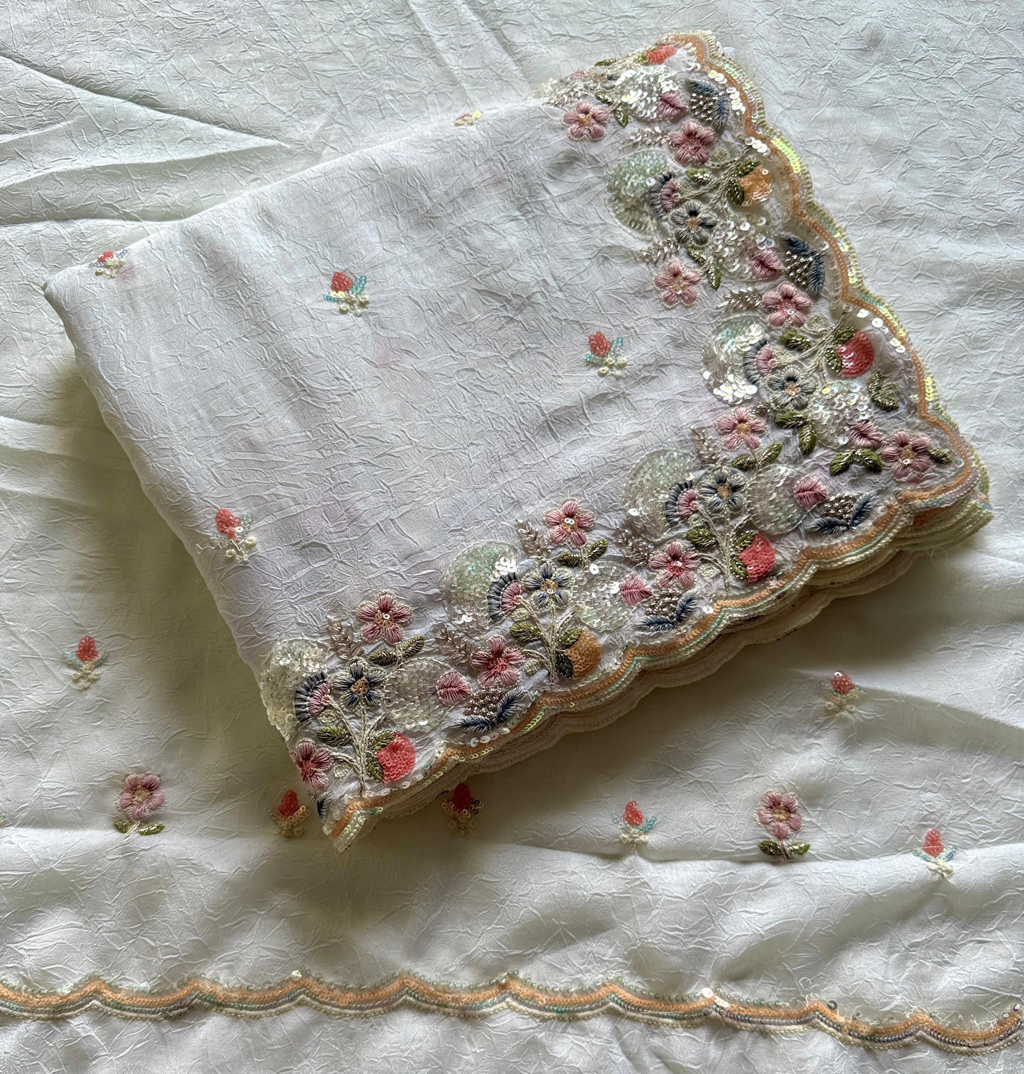 Embroidered fabric with floral patterns on a white background-Multicolor 4m sequin embroidery saree with soft lightweight fabric