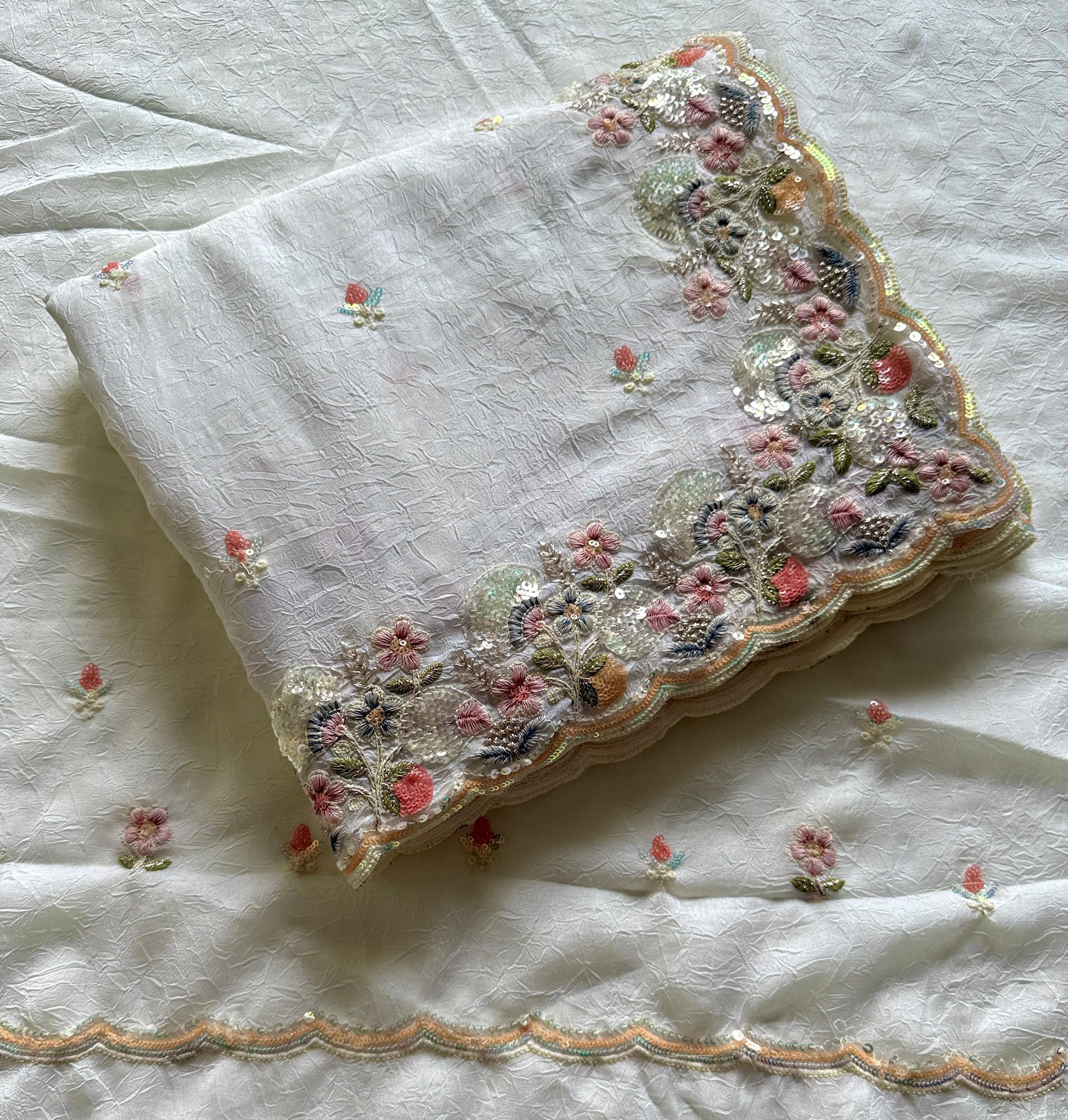 Embroidered fabric with floral patterns on a white background-Multicolor 4m sequin embroidery saree with soft lightweight fabric