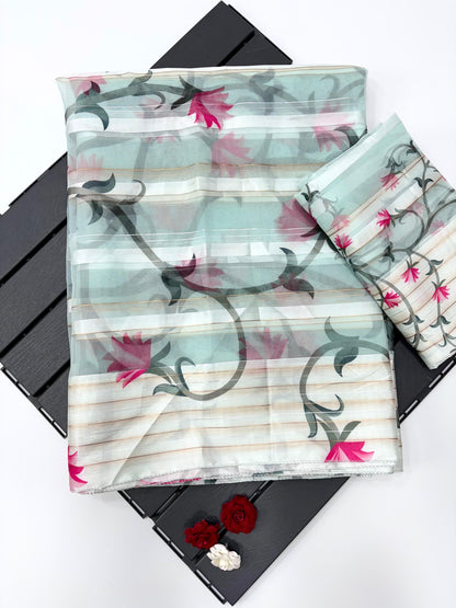 Floral patterned fabric on a black surface with a white background-Soft organza satin patta saree with digital floral print and matching blouse-light-weight-original