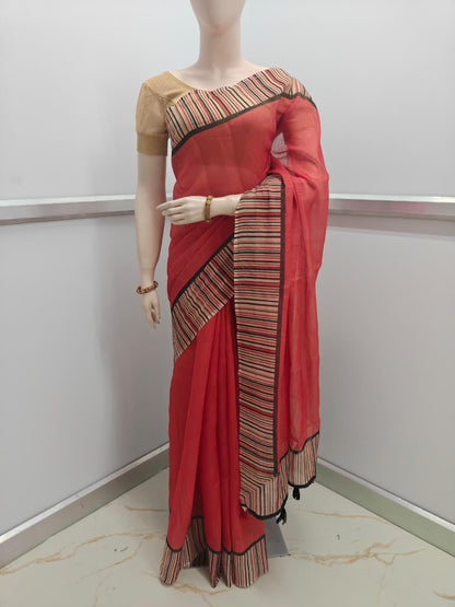 Red saree with black and gold border on a mannequin against a white background-Lightweight Linen Cotton Saree for office and daily wear – soft breathable fabric