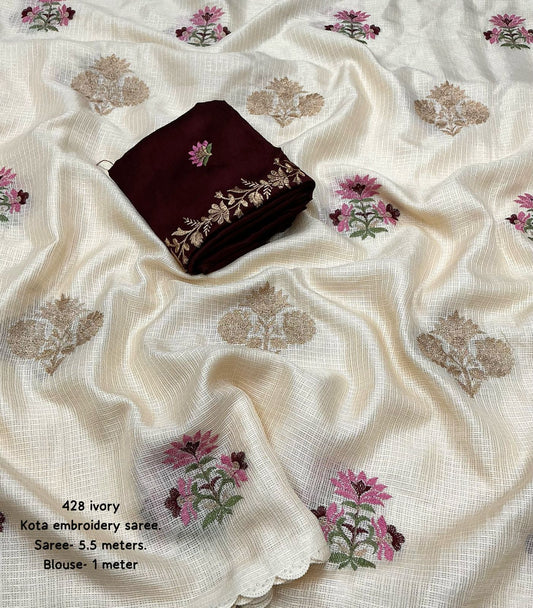 Ivory Kota Silk Saree with Zari and Embroidery Work featuring Cutwork Lace and Contrast Phantom Silk Blouse