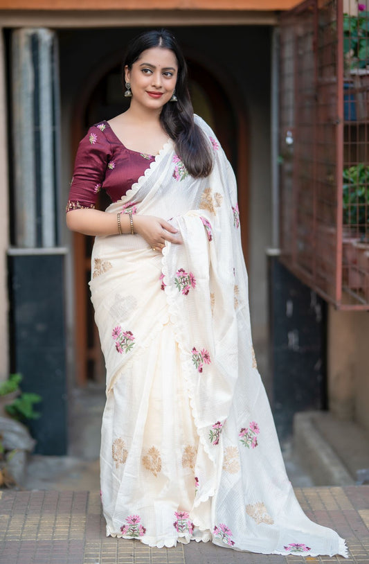 Ivory Kota Silk Saree with Zari and Embroidery Work featuring Cutwork Lace and Contrast Phantom Silk Blouse – Rafia Fashions