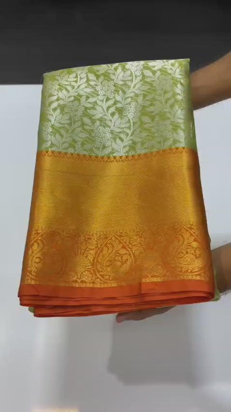 Pure Banarasi soft Katan silk saree in Orange with Green contrast border and zari weaving floral jaal design