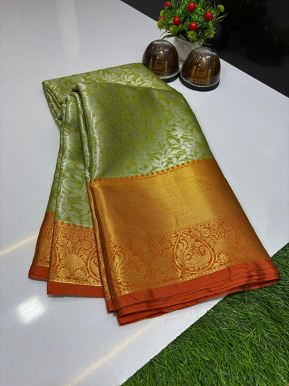 Pure Banarasi soft Katan silk saree in Green with contrast Orange border and zari weaving floral jaal design
